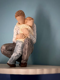 In Safe Hands Statue